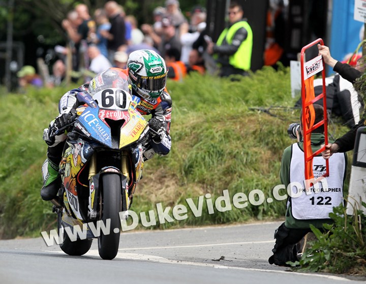 TT 2014 Peter Hickman checks his board - click to enlarge