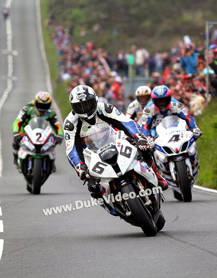 Michael Dunlop leads the pack in to Creg-ny-Baa - click to enlarge